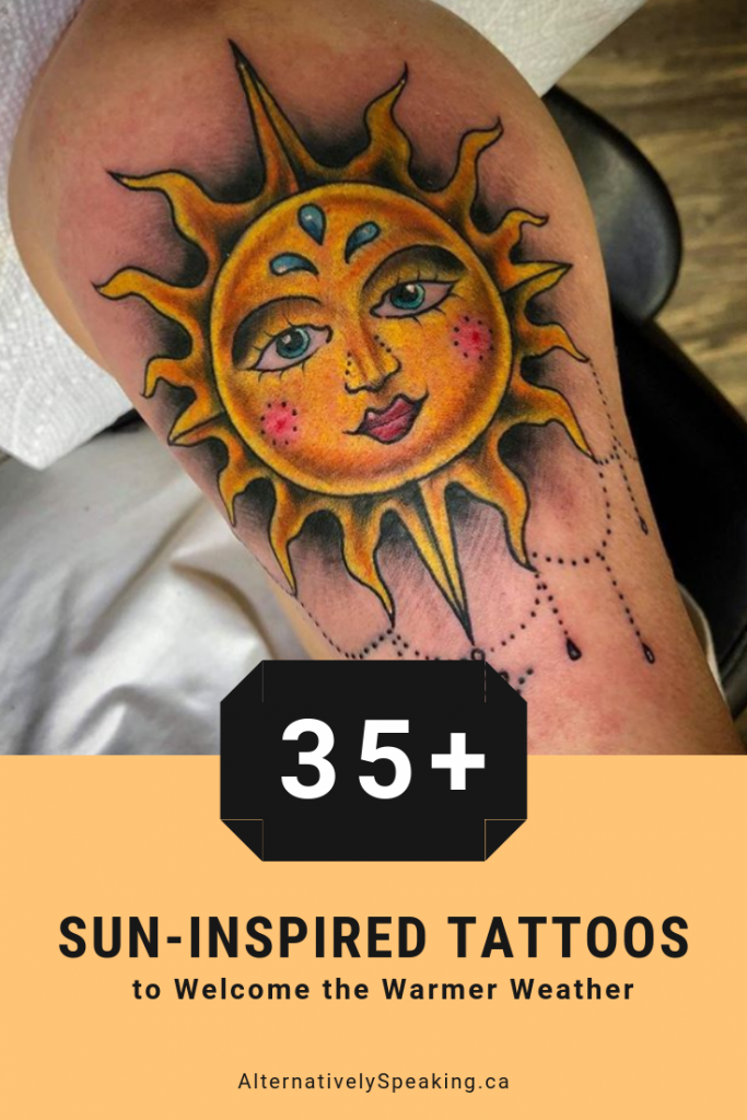bold, colourful tattoo of a sun with a face and crystals hanging from it