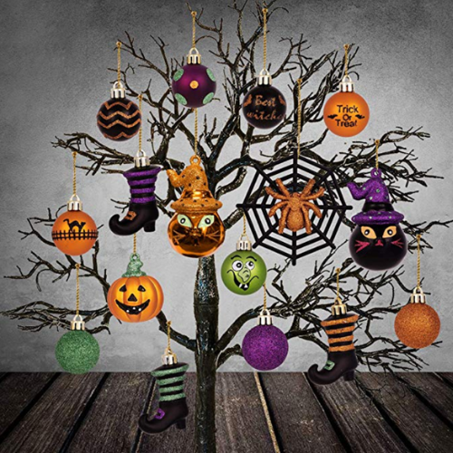 black leafless tree covered with halloween-themed ornaments