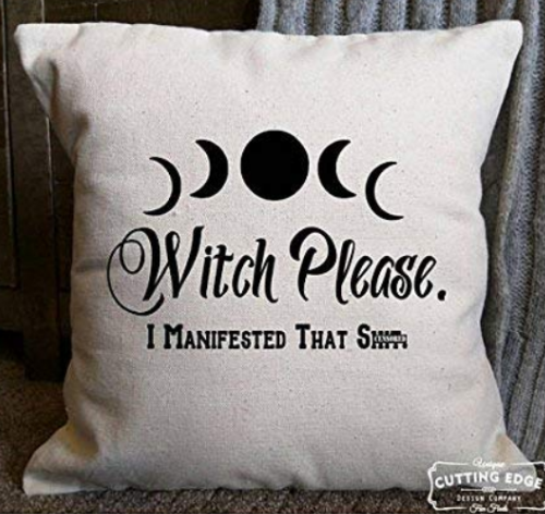 neutral coloured throw pillow that depicts the moon phases with the caption 'witch please, I manifested that shit'