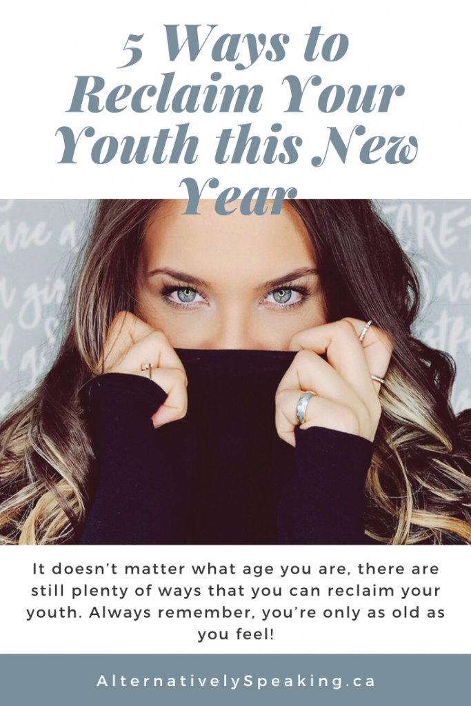 close up of a brunette woman wearing a black turtleneck, holding the neck of her sweater up over her nose with the title '5 ways to reclaim your youth this new year'