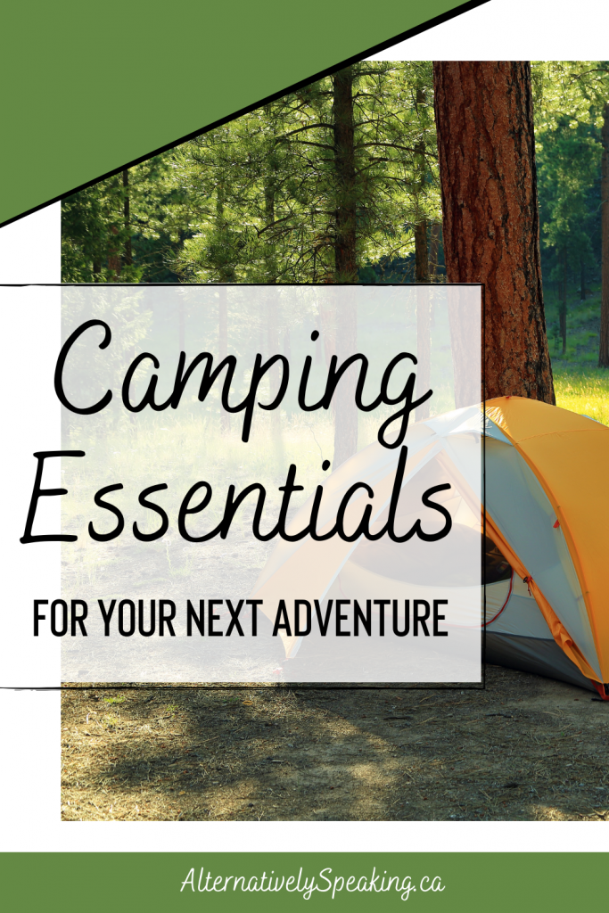 tent set up in a forest area pin | The Camping Essentials You’ll Need for Your Next Adventure