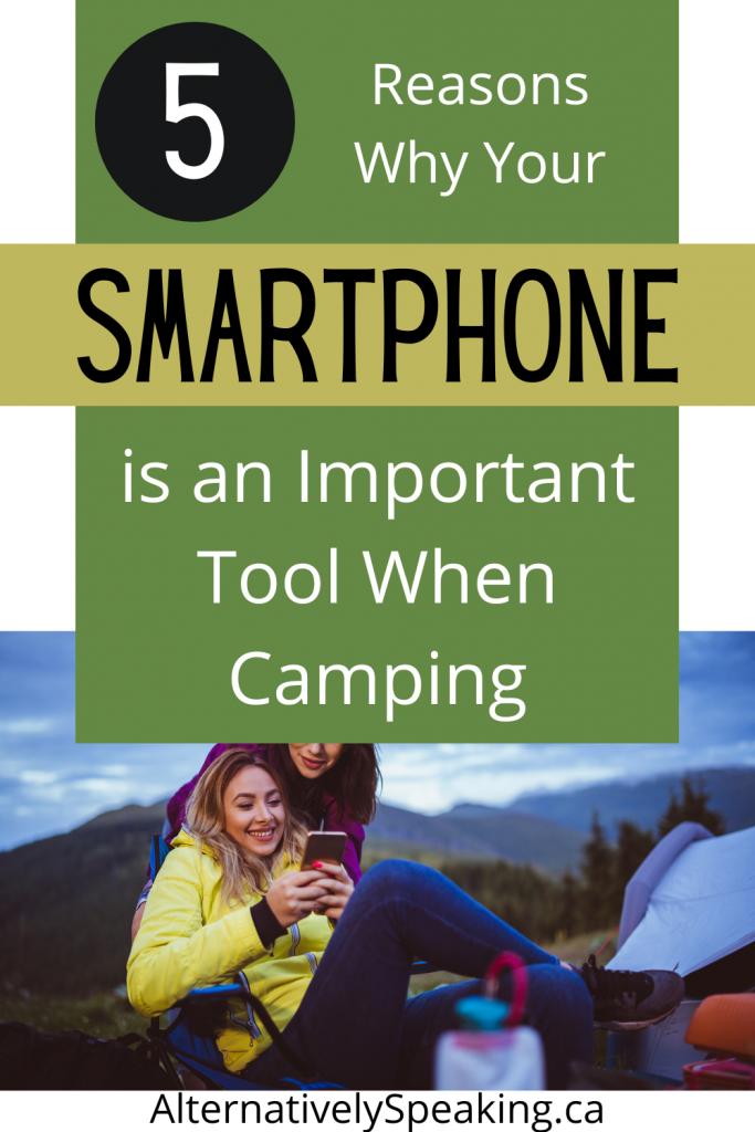two women looking at smartphone at campsite pin | Five Reasons Why Your Smartphone is an Important Tool When Camping